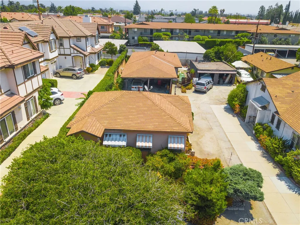 826 Sunset Boulevard Arcadia, CA 91007 - Photo 12 of 13 an aerial view of a house with a garden and lake view