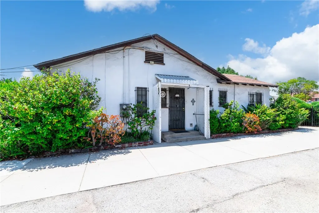 826 Sunset Boulevard Arcadia, CA 91007 - Photo 4 of 13 a view of a house with potted plants