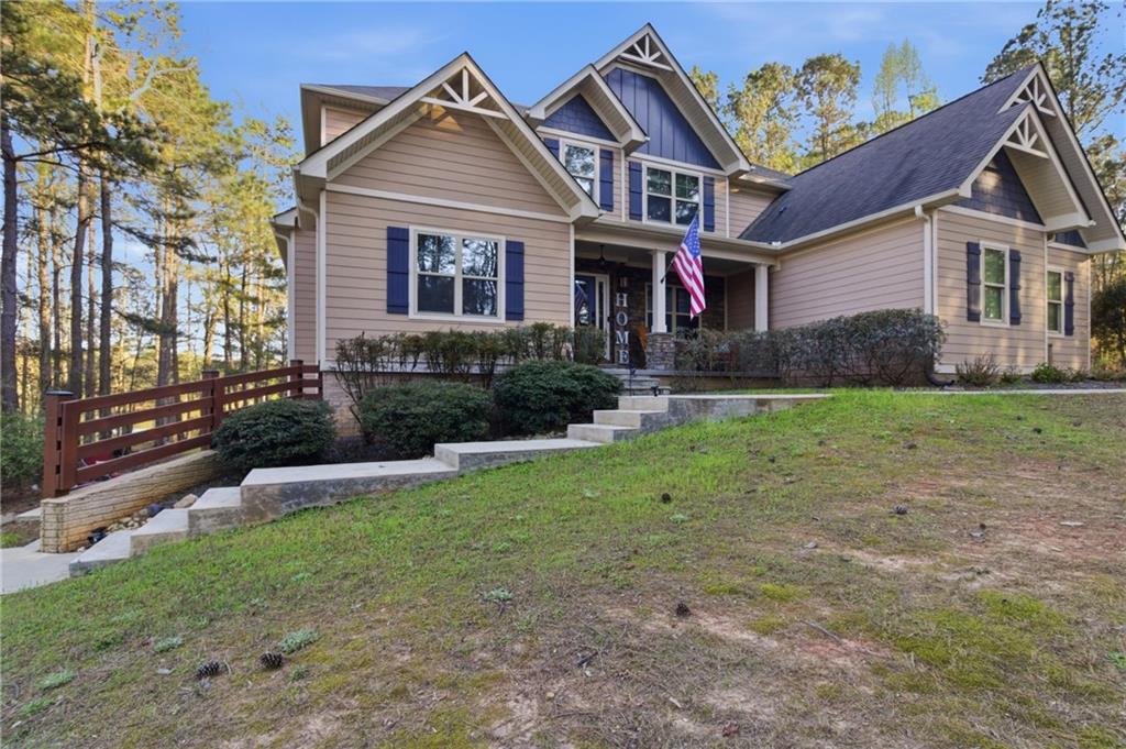 37 Farmstead Way Senoia, GA 30276 - Photo 11 of 121 a front view of a house with a yard