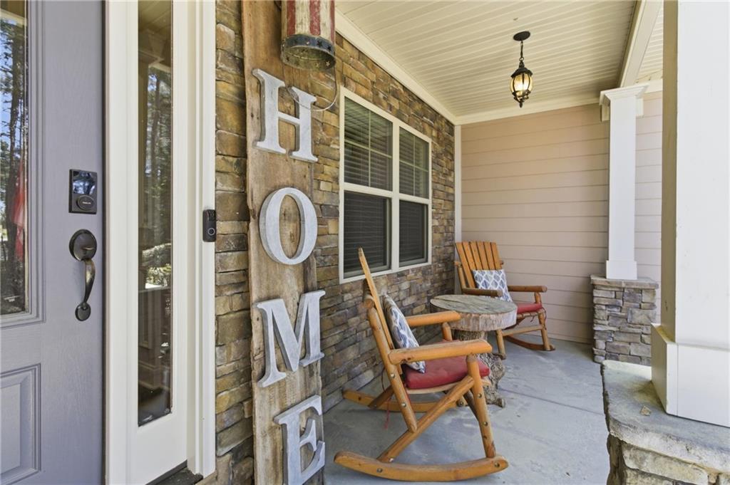 37 Farmstead Way Senoia, GA 30276 - Photo 18 of 121 a couple of chairs sitting in front of a door