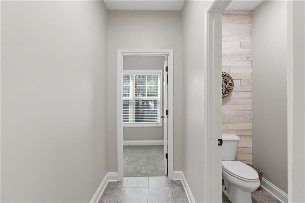 37 Farmstead Way Senoia, GA 30276 - Photo 31 of 121 a bathroom with a toilet and a shower