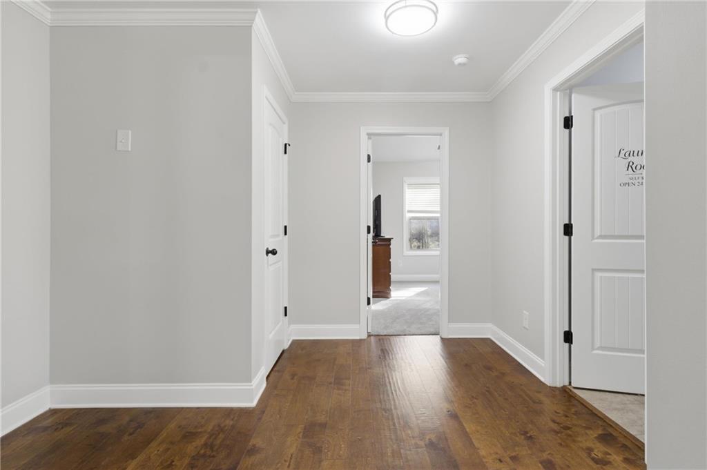37 Farmstead Way Senoia, GA 30276 - Photo 48 of 121 a view of empty room with wooden floor