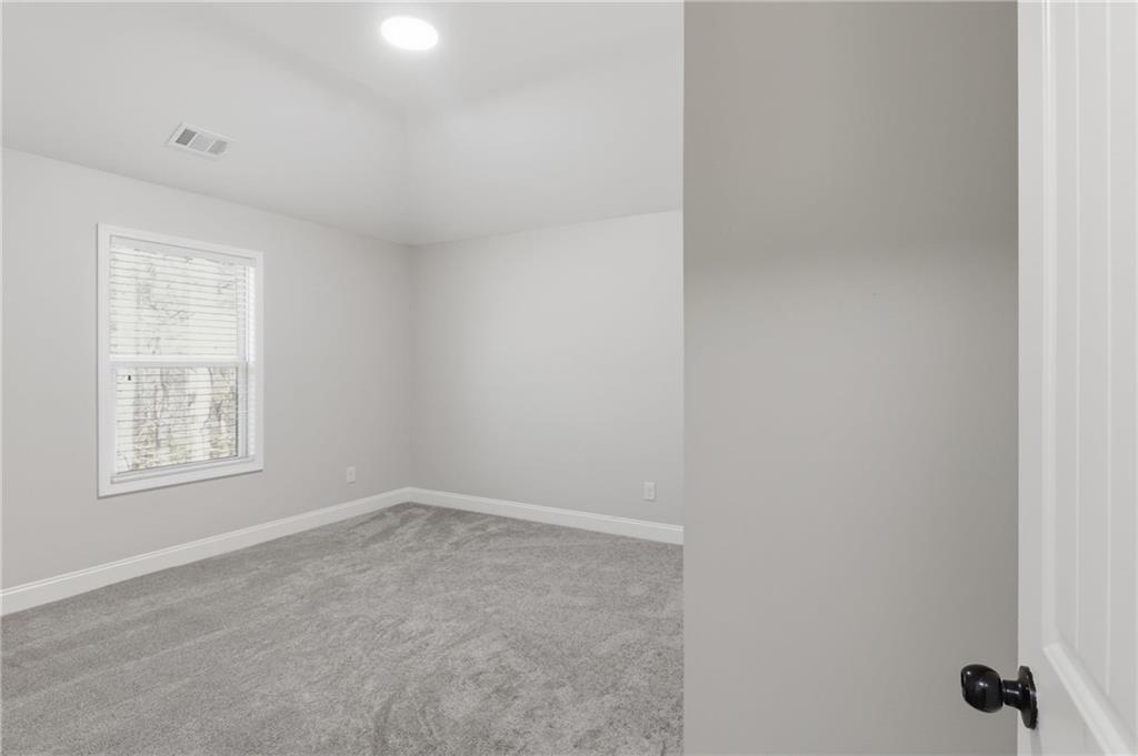 37 Farmstead Way Senoia, GA 30276 - Photo 53 of 121 an empty room with a window
