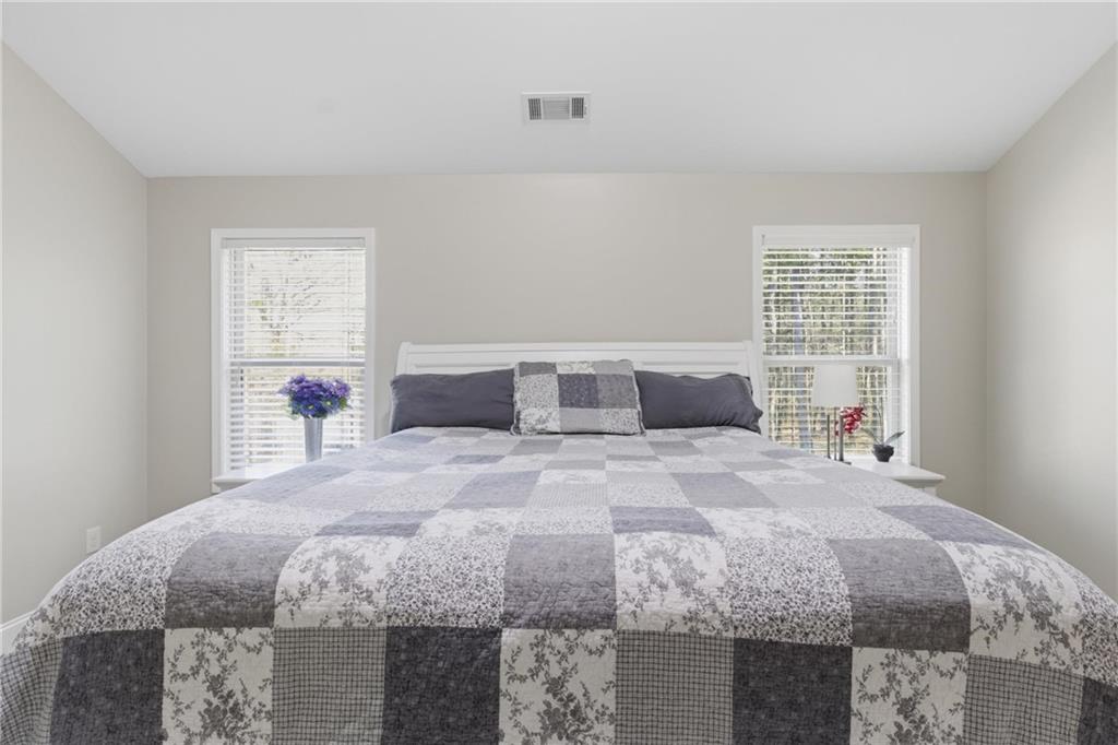 37 Farmstead Way Senoia, GA 30276 - Photo 60 of 121 a bedroom with a bed and a window