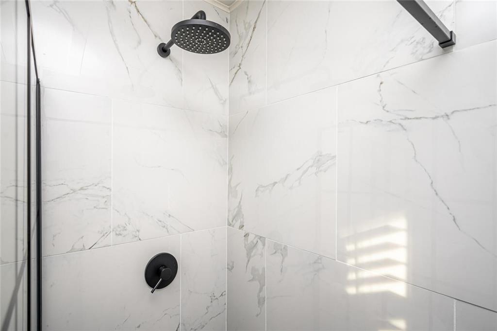 3154 Oakcliff Road Northwest Atlanta, GA 30311 - Photo 19 of 41 a bathroom with a shower
