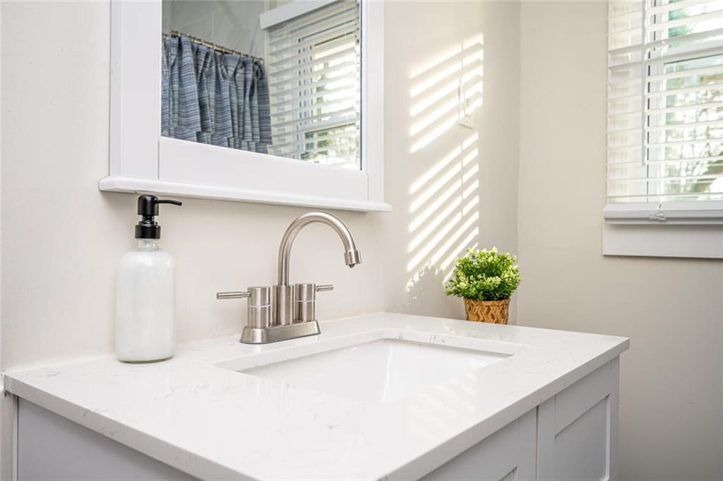 3154 Oakcliff Road Northwest Atlanta, GA 30311 - Photo 23 of 41 a kitchen with a sink and a window