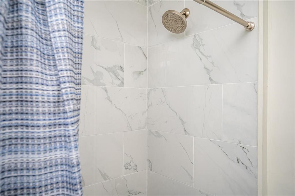 3154 Oakcliff Road Northwest Atlanta, GA 30311 - Photo 24 of 41 a bathroom with a shower