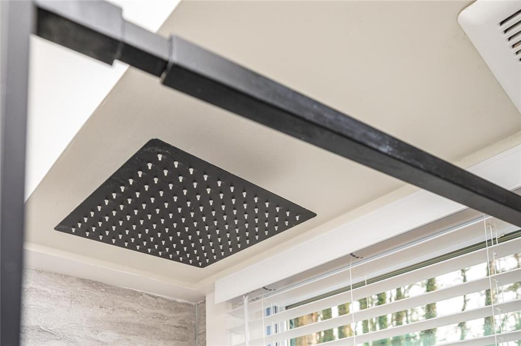 3154 Oakcliff Road Northwest Atlanta, GA 30311 - Photo 36 of 41 a picture of a black and white wall