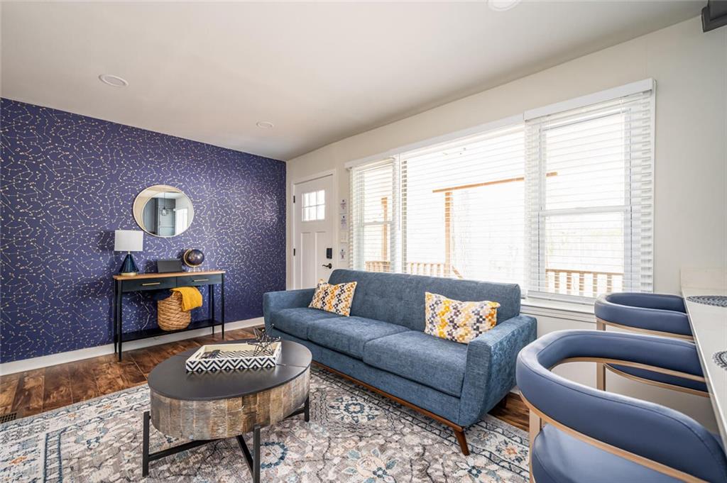 3154 Oakcliff Road Northwest Atlanta, GA 30311 - Photo 8 of 41 a living room with furniture and a window
