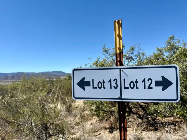 a view of outdoor space with a street sign