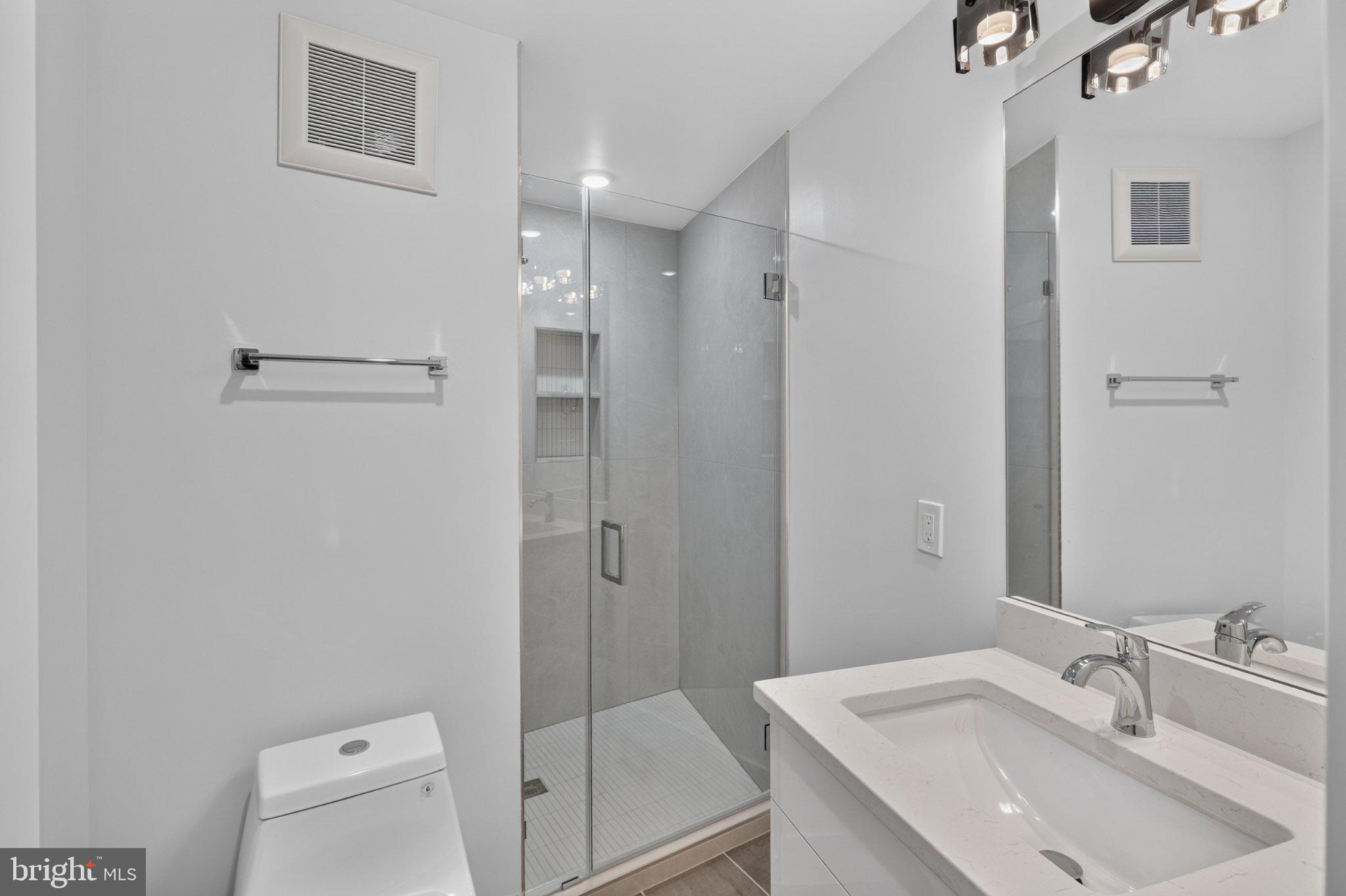 1650 Columbia Road Northwest, Unit 402 Washington, DC 20009 - Photo 19 of 19 Sleek modern bathroom oasis.
