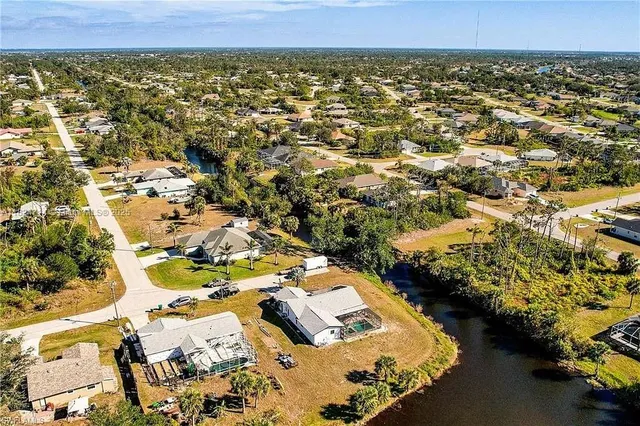an aerial view of residential house with outdoor space