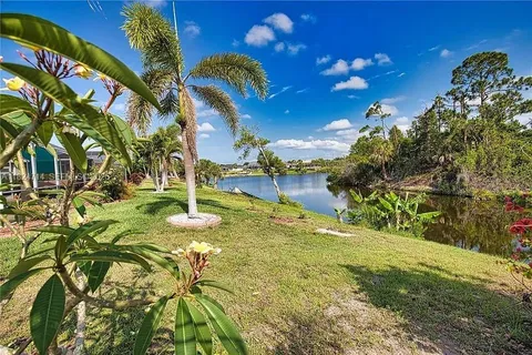 a backyard of a house with lots of green space