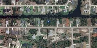 a view of a lake with a building in front of it