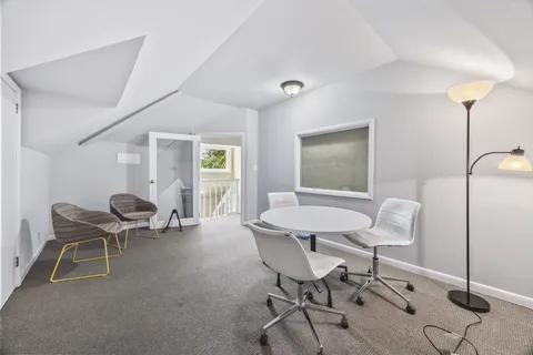 a en suite bathroom with a sink and mirror