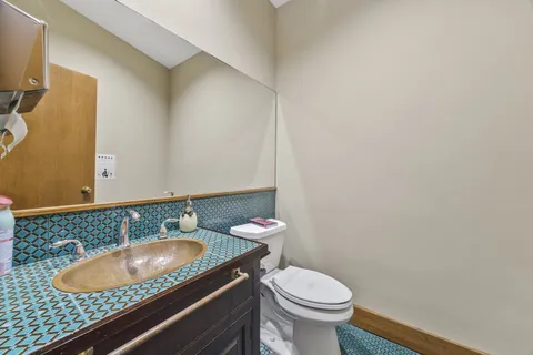 a view of a brick building with many windows