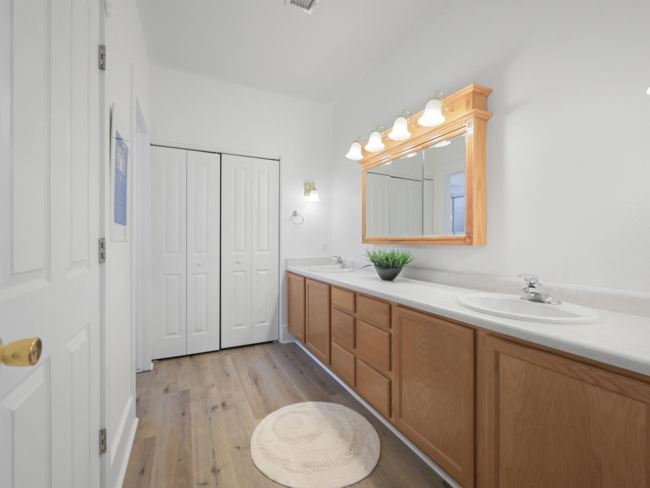 1117 Buttercup Lane Fruita, CO 81521 - Photo 17 of 25 a bathroom with a sink mirror and a toilet
