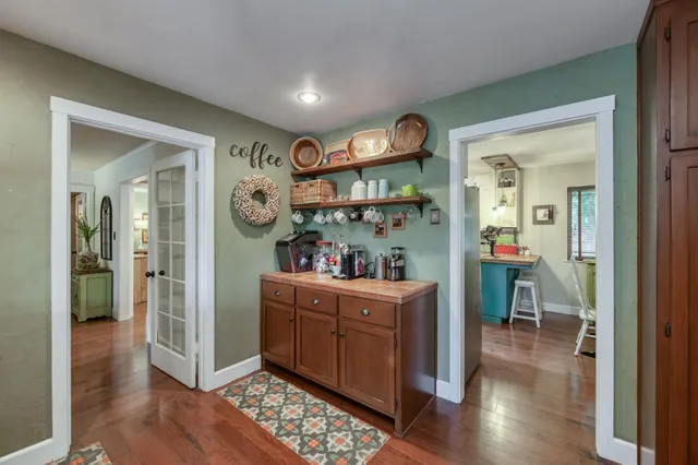 a room with furniture and wooden floor