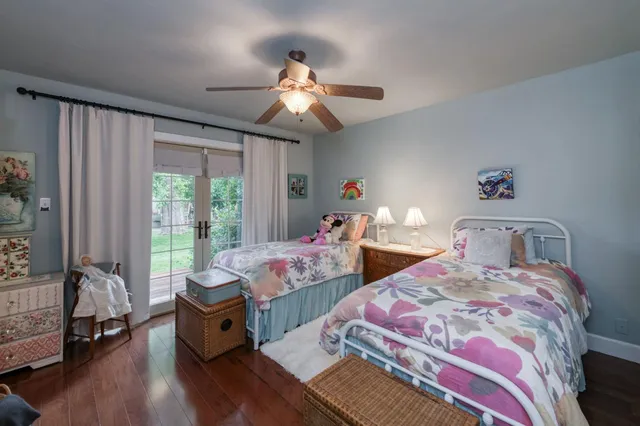 a bathroom with a sink a mirror and a window