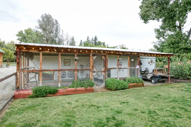 a outdoor space with lots of tables and chairs