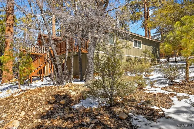 a view of a yard with trees