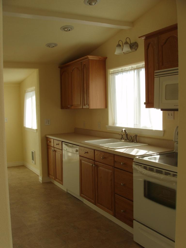 14840 Summitview Ext Road Yakima, WA 98908 - Photo 14 of 19 a kitchen that has a sink and a stove