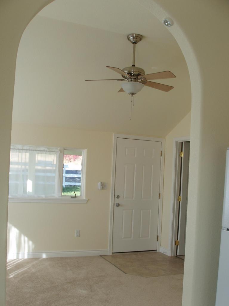 14840 Summitview Ext Road Yakima, WA 98908 - Photo 17 of 19 an empty room with windows and fan