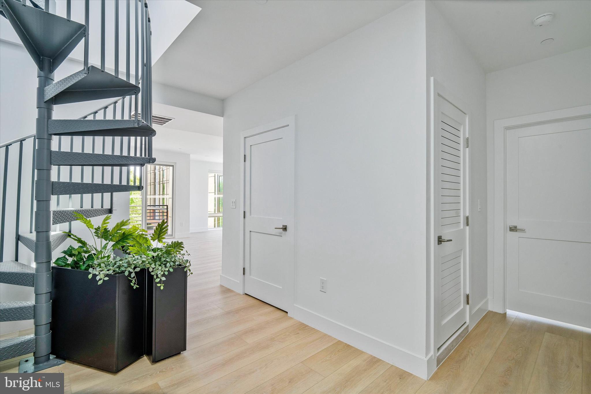 228 West Glebe Road, Unit 301 Alexandria, VA 22305 - Photo 3 of 13 Unit Entrance W/Spiral Stairs to Roof Deck