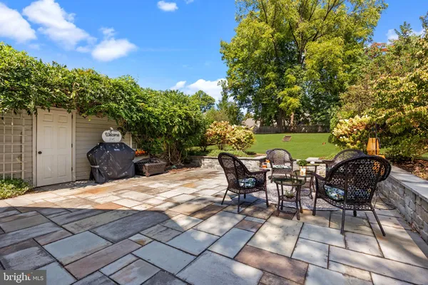 a view of a backyard with furniture