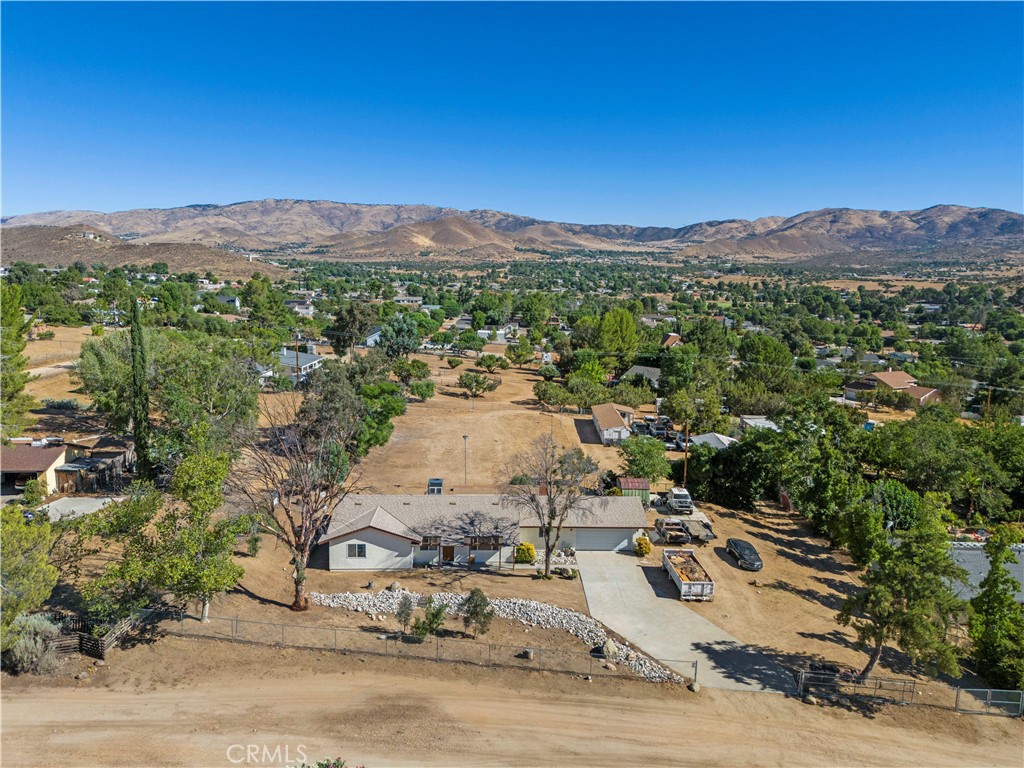an aerial view of residential house with outdoor space