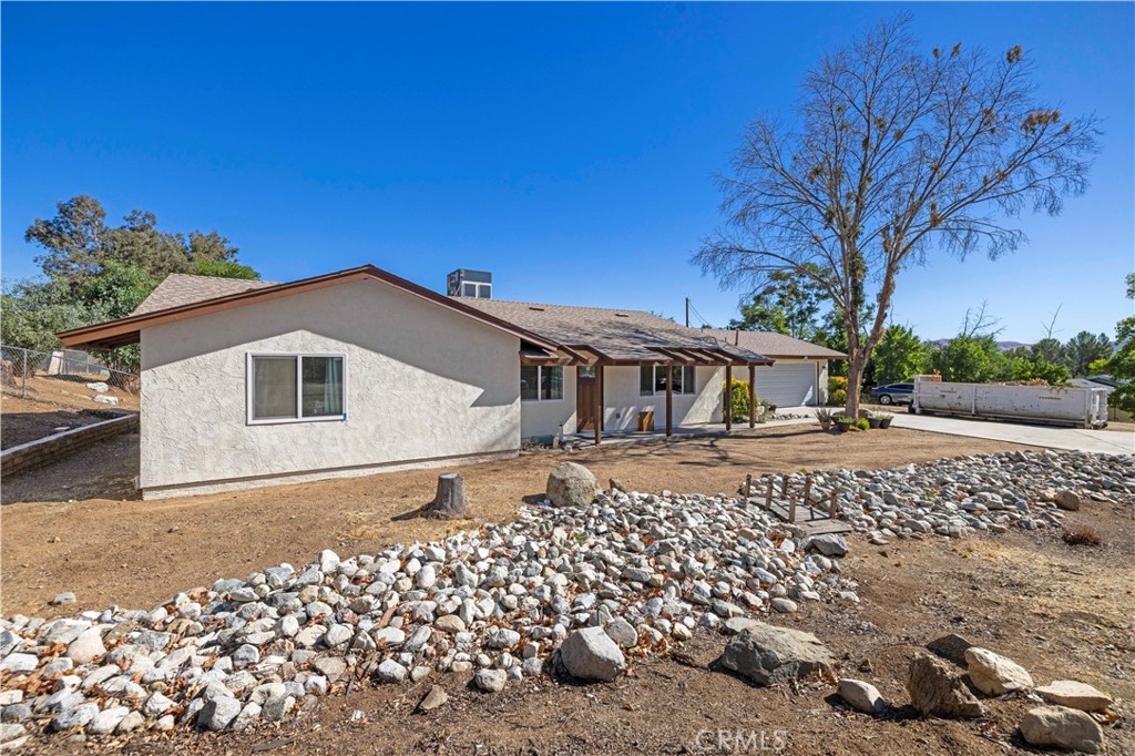 3855 Acton Avenue Acton, CA 93510 - Photo 13 of 21 a front view of a house with a yard