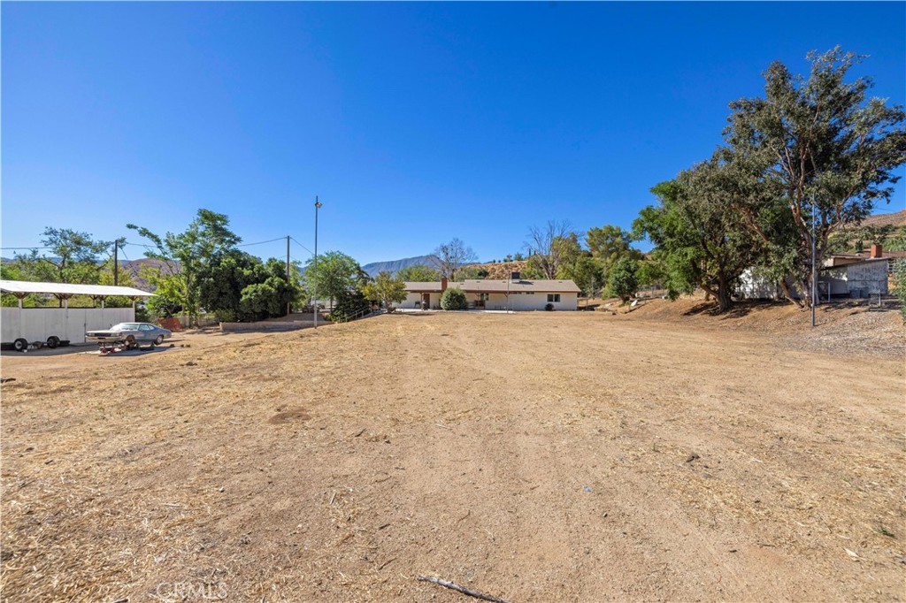 3855 Acton Avenue Acton, CA 93510 - Photo 19 of 21 a car parked on the side of the road