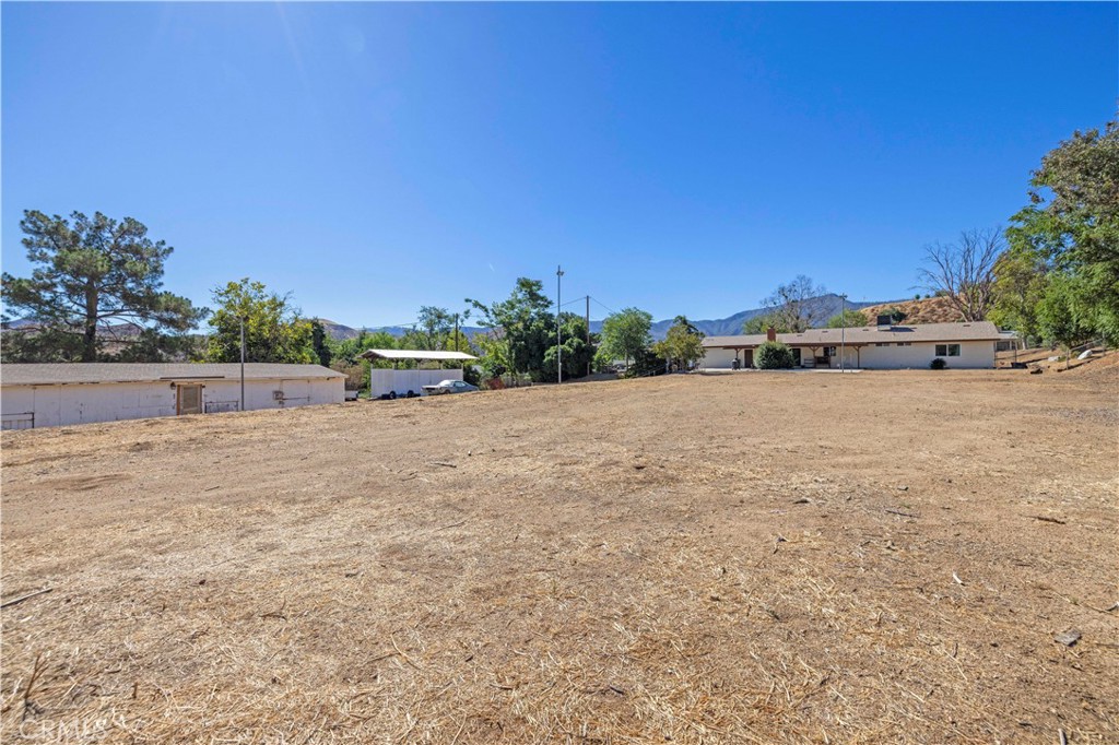 3855 Acton Avenue Acton, CA 93510 - Photo 20 of 21 a view of a dry yard with trees