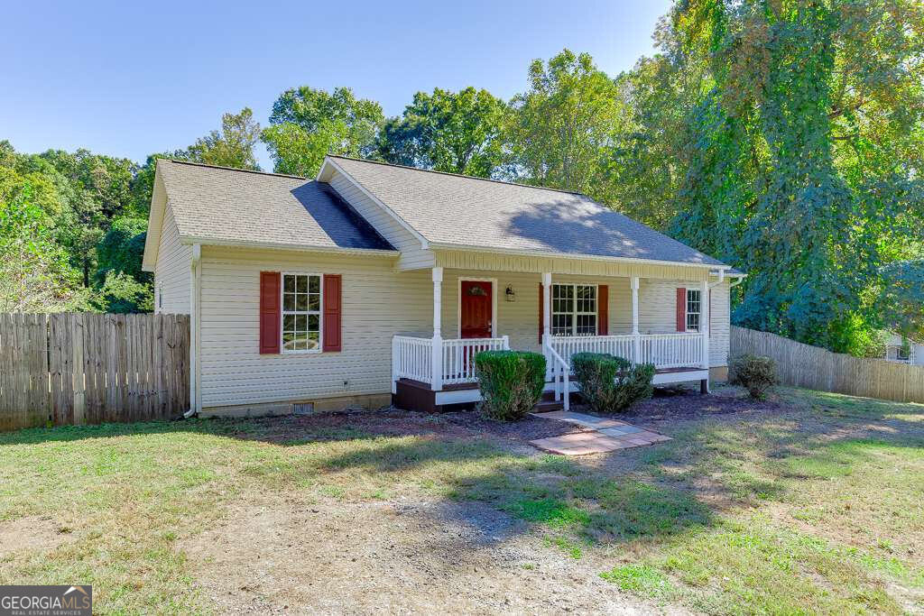 109 Driskell Road Cleveland, GA 30528 - Photo 1 of 1 a house that has a lot of plants in it