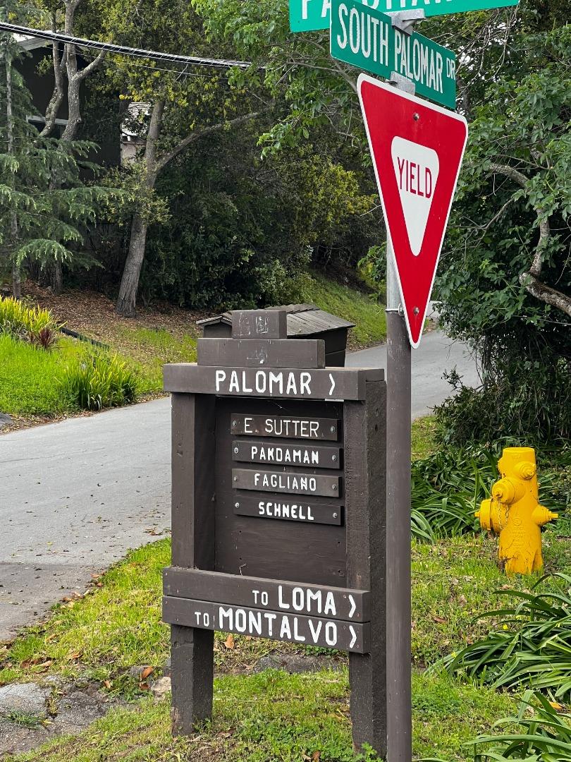 758 Loma Redwood City, CA 94062 - Photo 16 of 16 a sign on the side of the road