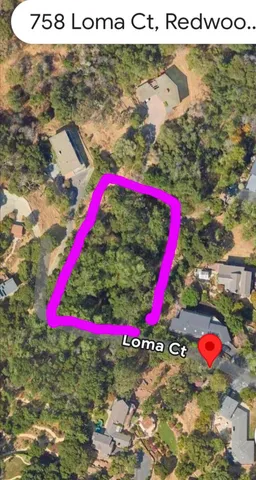 a view of street with small yard