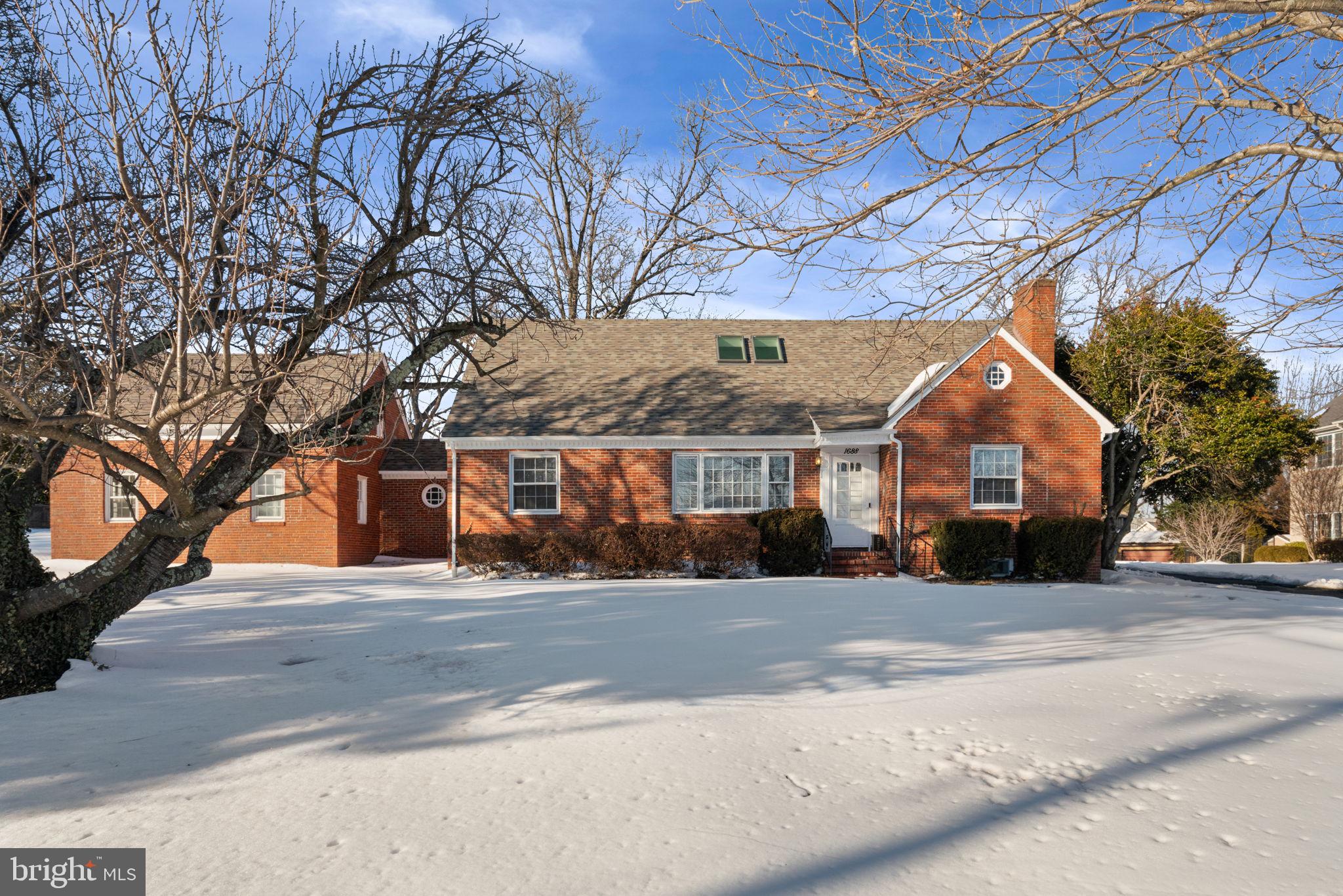 1688 Chain Bridge Road McLean, VA 22101 - Photo 1 of 4 a front view of a house
