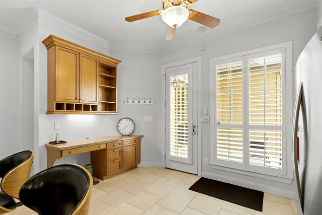 a kitchen with a refrigerator a sink and a large window