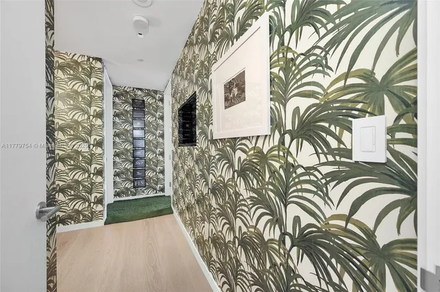 a view of a door and with plants