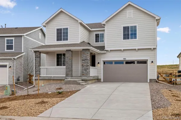 a front view of a house with a garage