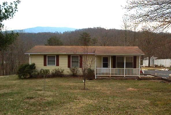 6320 Meacham Road Salem, VA 24153 - Photo 1 of 1 a front view of a house with a garden