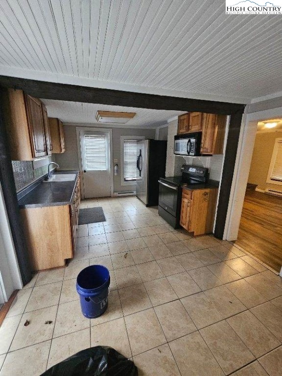 10884 Highway 105 Banner Elk, NC 28604 - Photo 5 of 11 a kitchen with a table and chairs