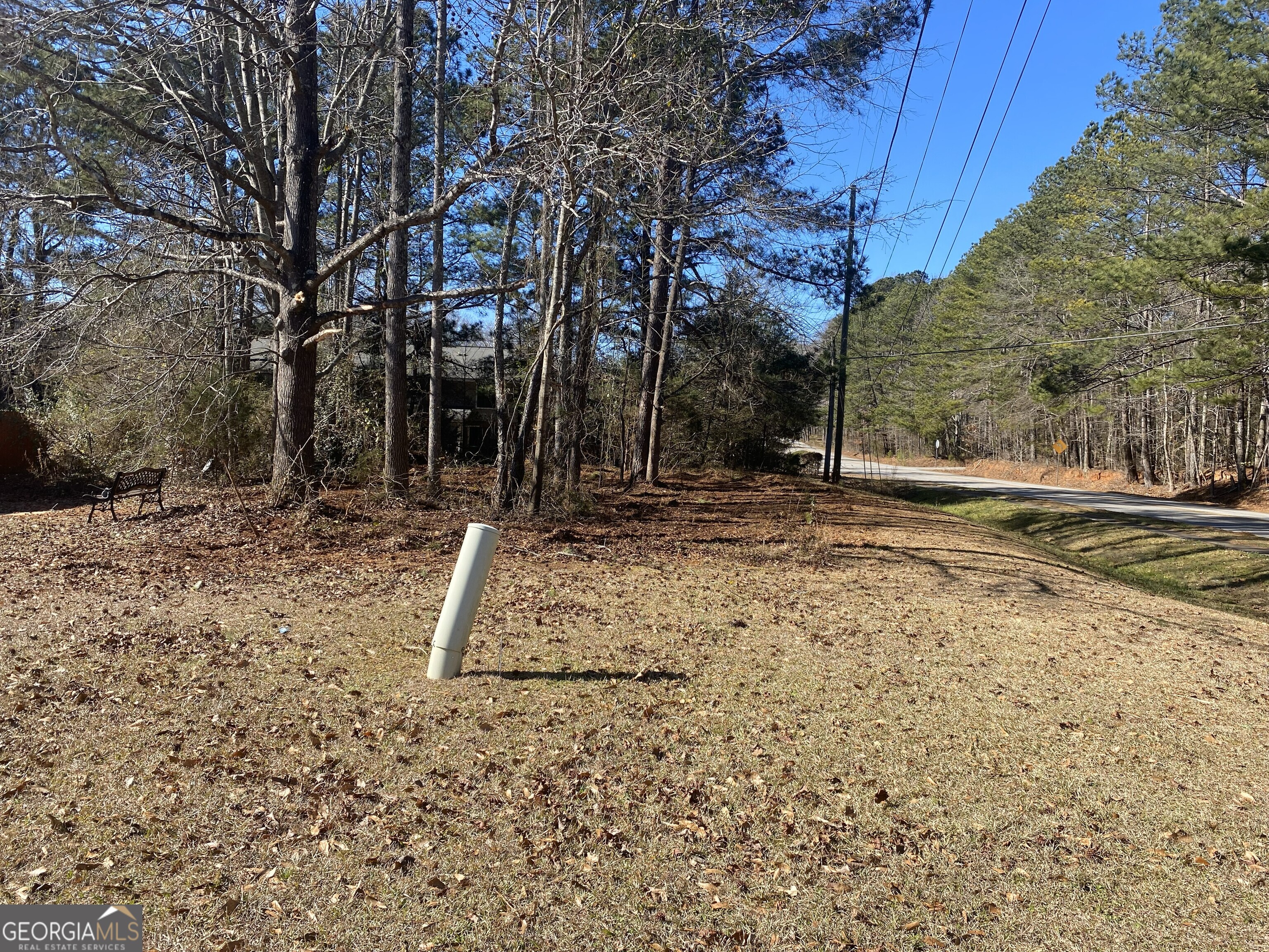 0 Hannah Street, Unit LOT 1 Barnesville, GA 30204 - Photo 3 of 7 a view of a yard with wooden fence