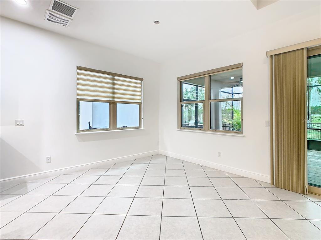 8325 Topsail Place Winter Garden, FL 34787 - Photo 21 of 74 a view of an empty room and window