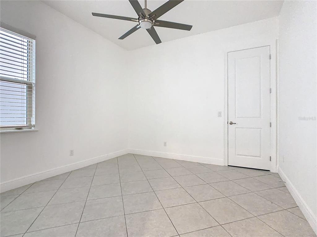 8325 Topsail Place Winter Garden, FL 34787 - Photo 37 of 74 an empty room with white walls and white walls