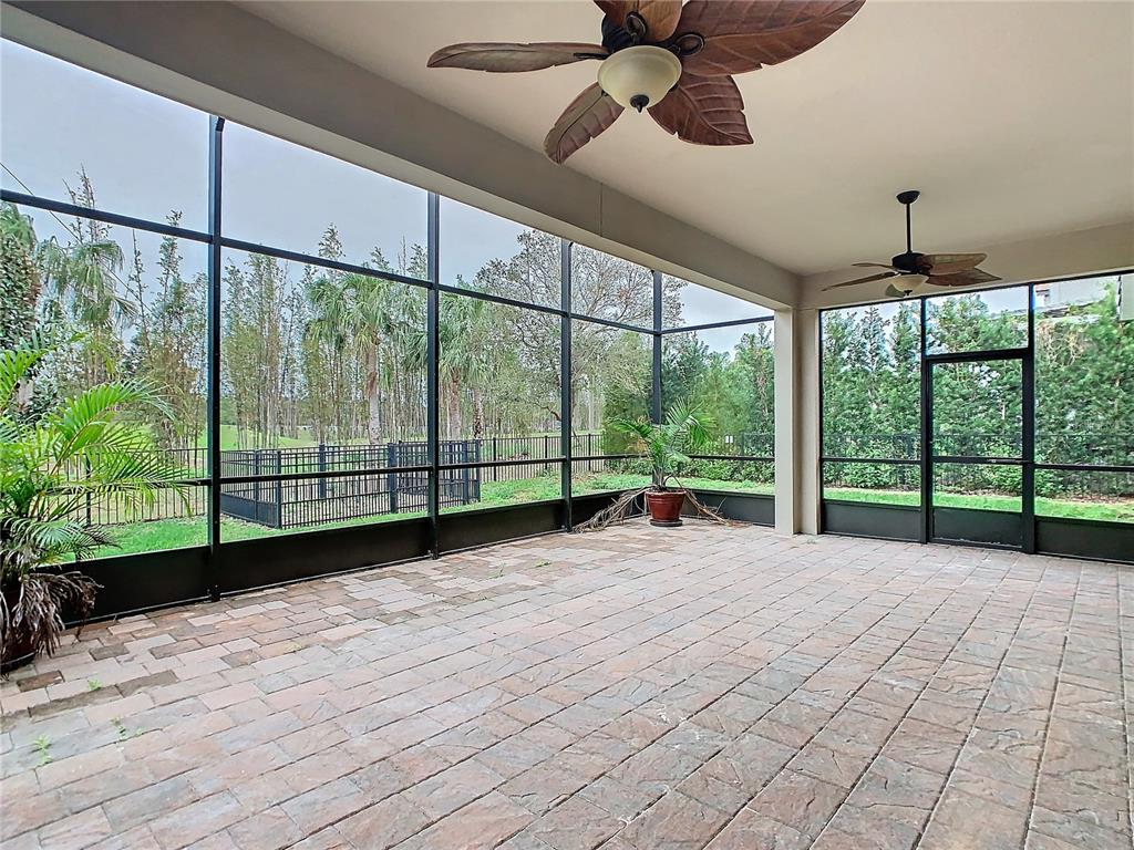 8325 Topsail Place Winter Garden, FL 34787 - Photo 45 of 74 a view of an empty room with windows