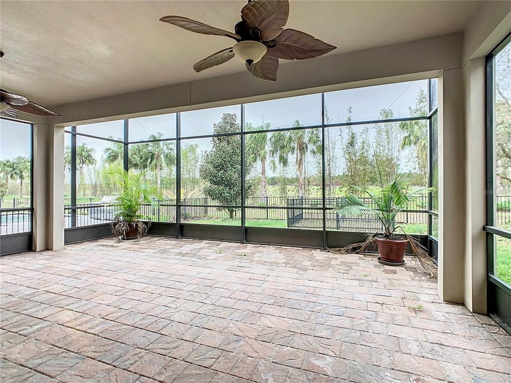 8325 Topsail Place Winter Garden, FL 34787 - Photo 46 of 74 a bed room with a large window