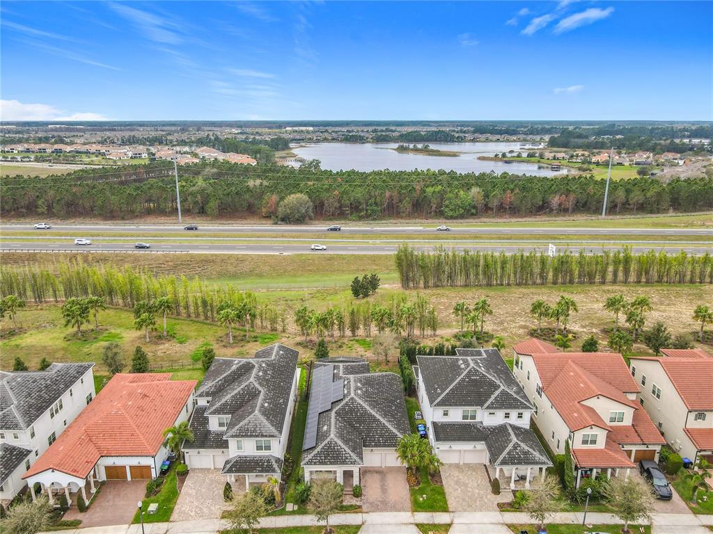 8325 Topsail Place Winter Garden, FL 34787 - Photo 5 of 74 a view of a lake with a ocean view