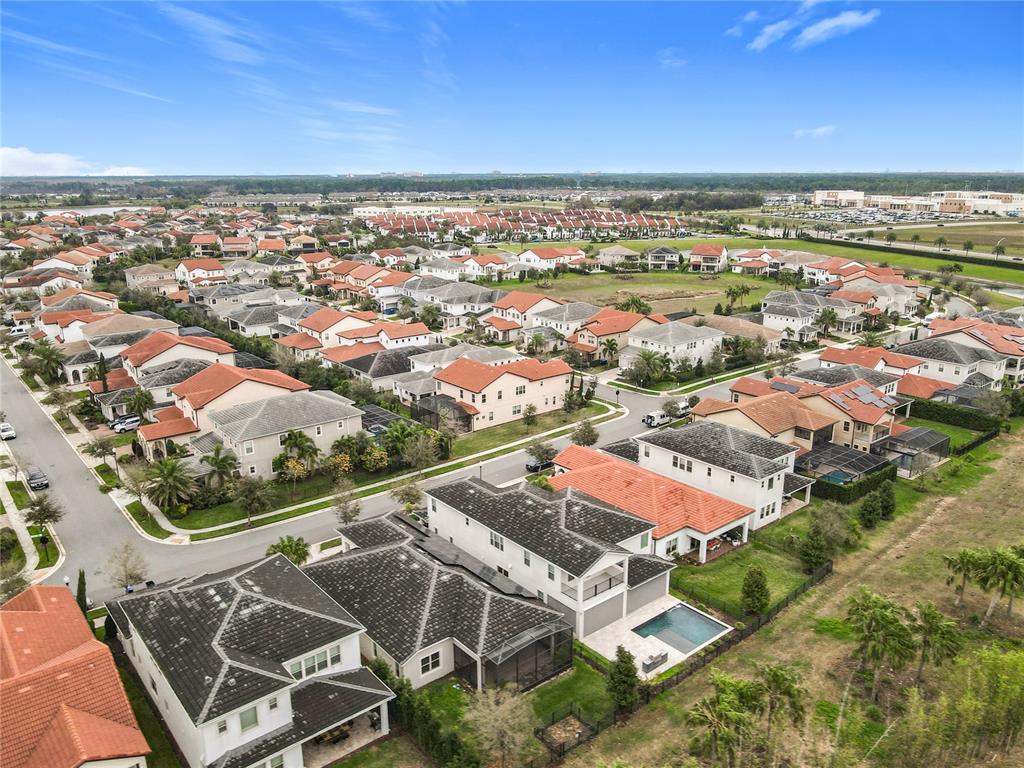 8325 Topsail Place Winter Garden, FL 34787 - Photo 57 of 74 an aerial view of residential building and lake