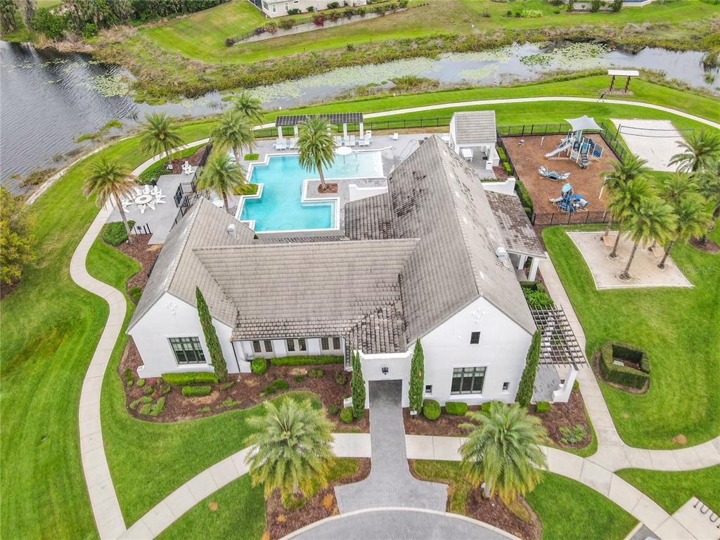 8325 Topsail Place Winter Garden, FL 34787 - Photo 61 of 74 an aerial view of a swimming pool with a yard